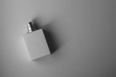 perfume in white square bottle